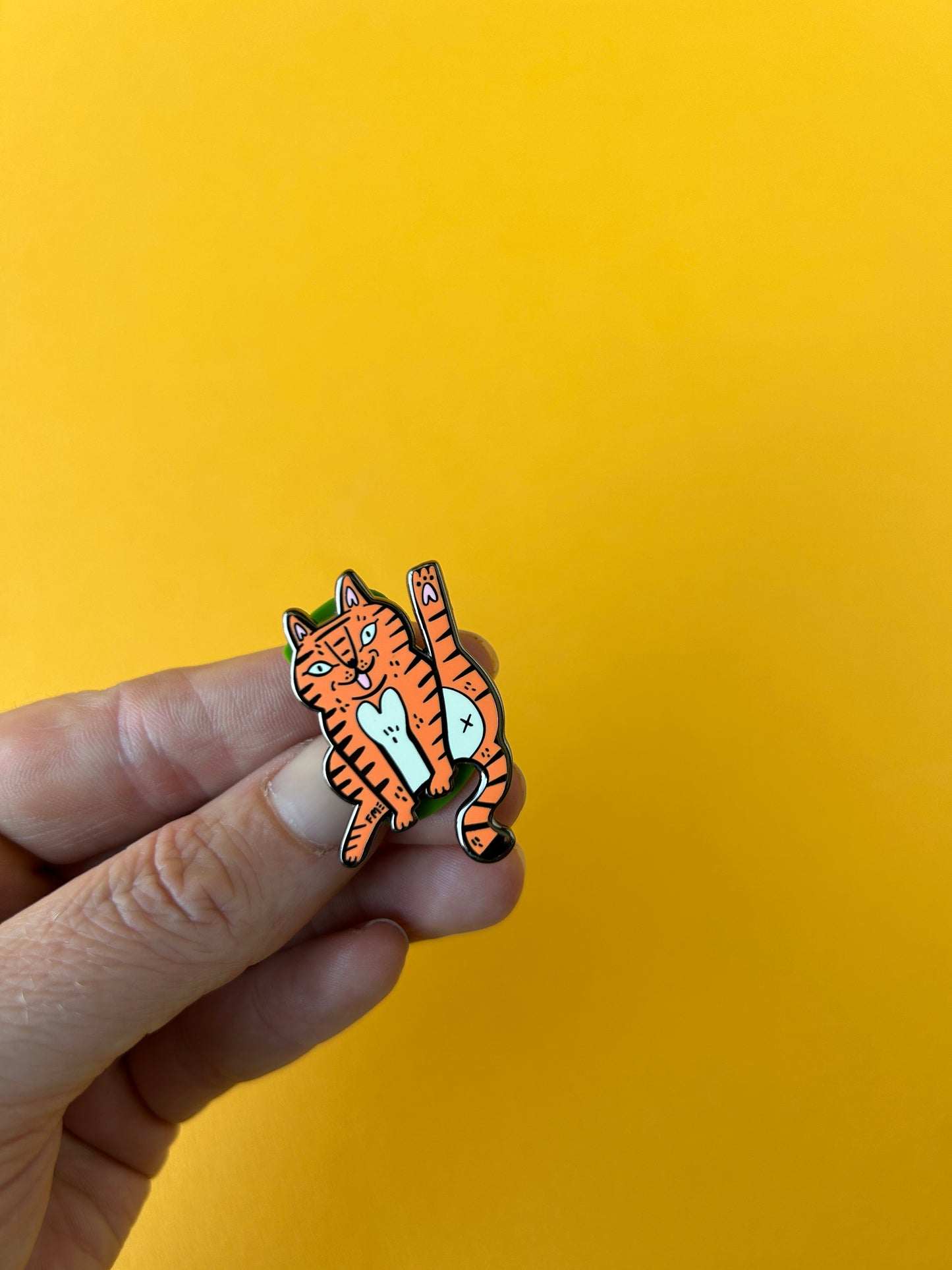 Cat Licking Enamel Pin