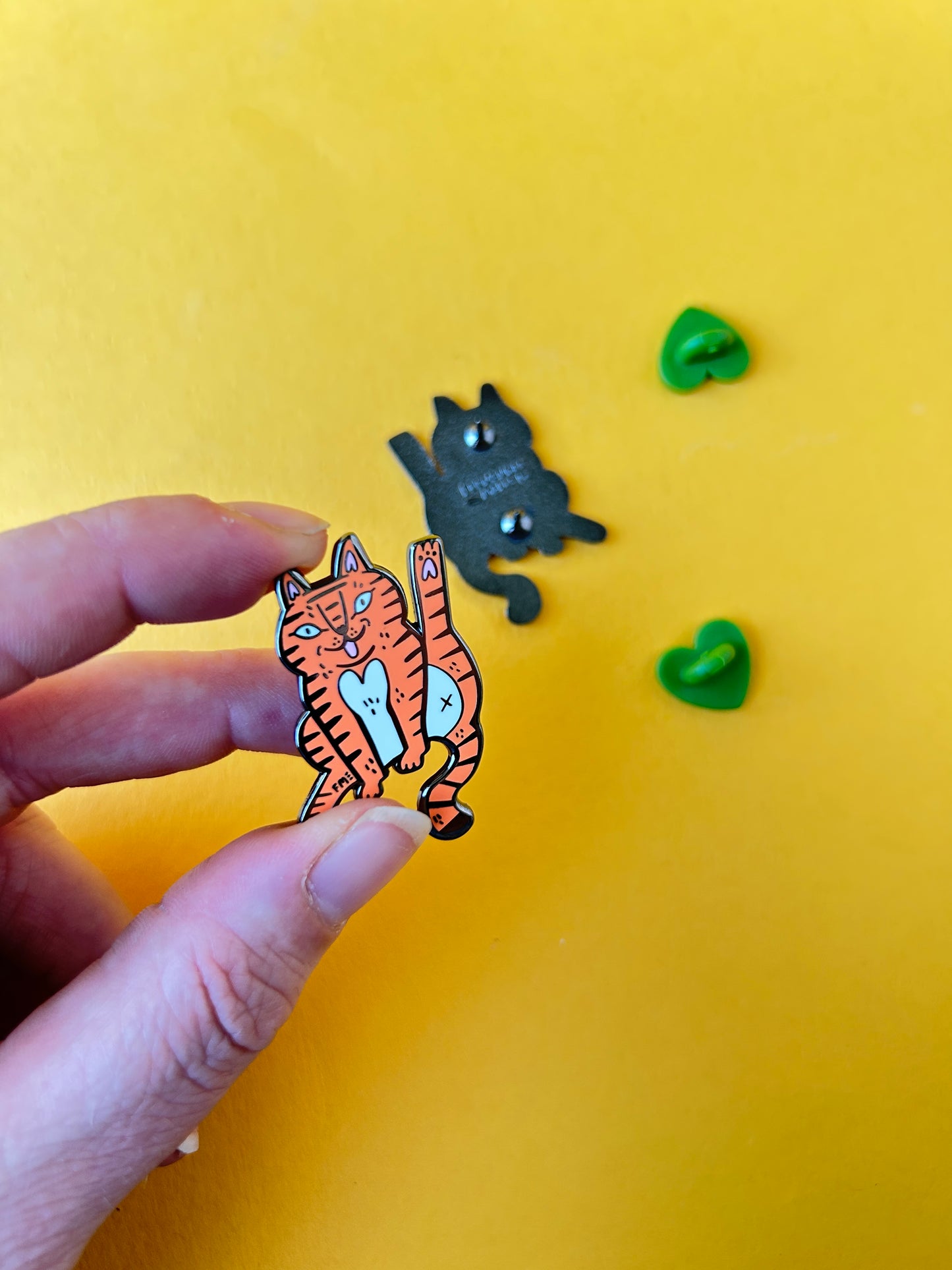 Cat Licking Enamel Pin