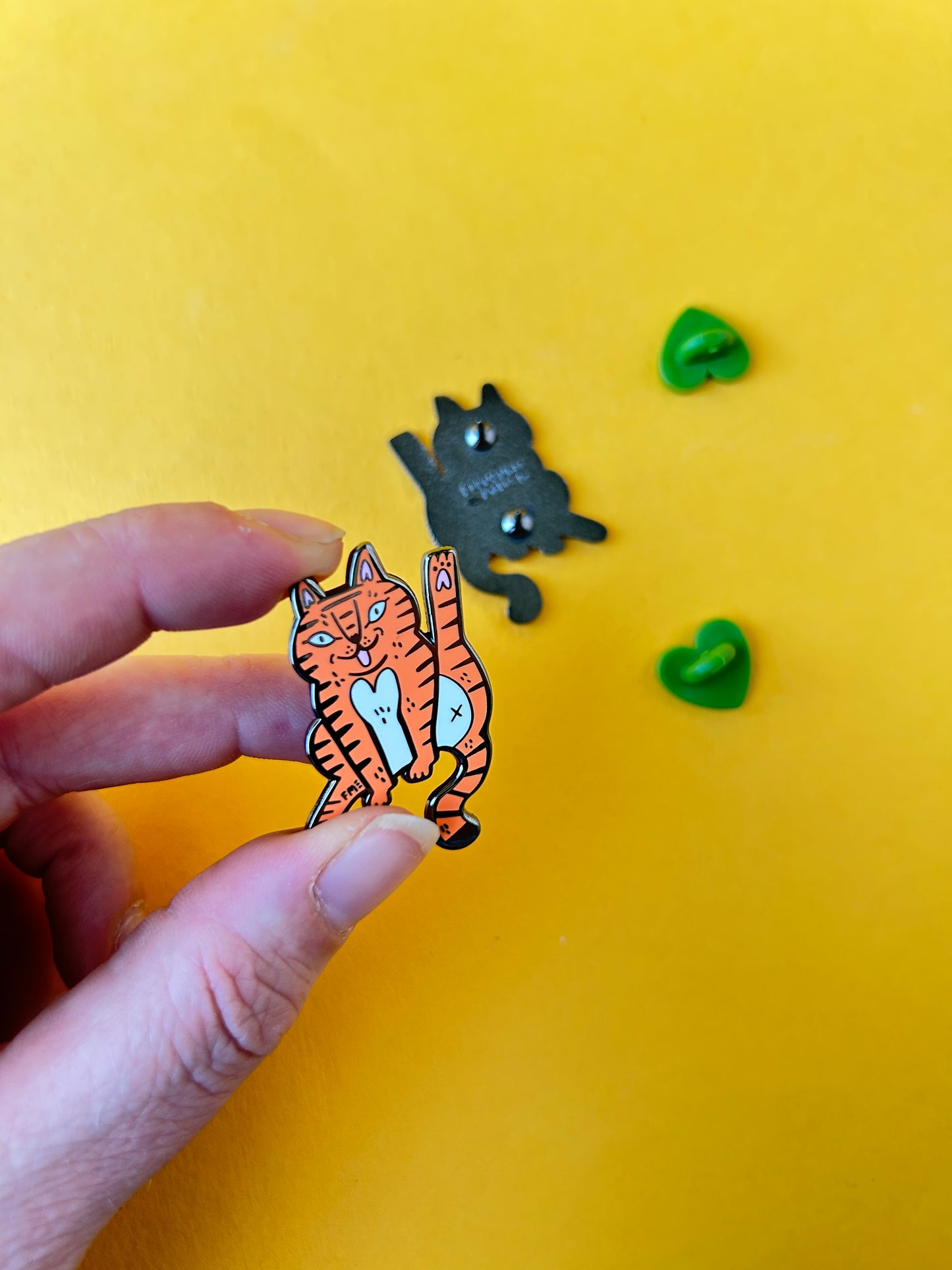 Cat Licking Enamel Pin