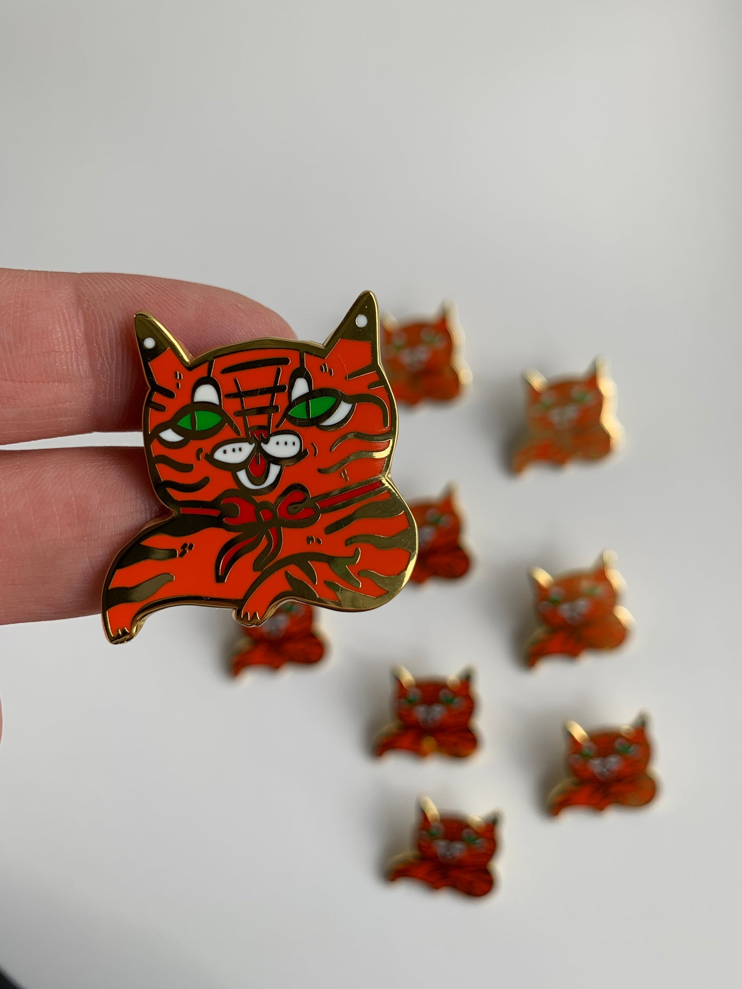 Red Bow Tiger Pin (Black or Gold)