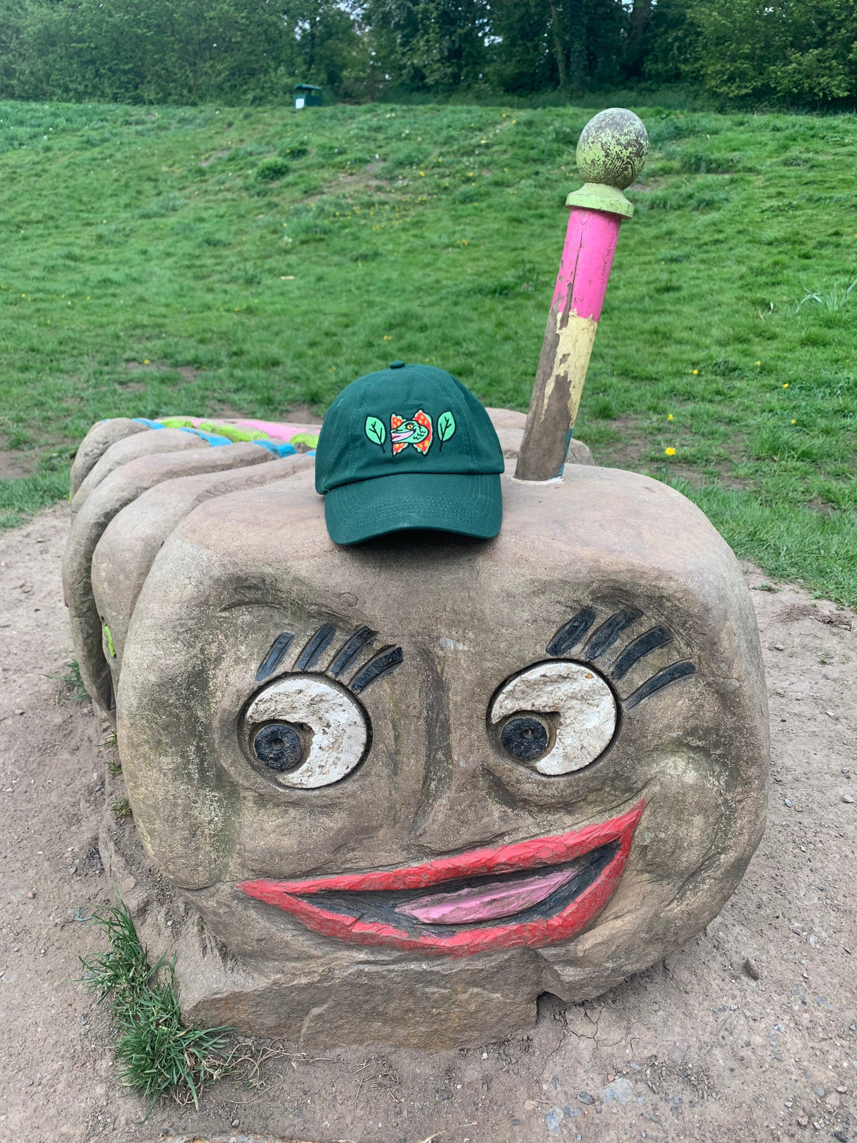 Happy Dilophosaurus Dinosaur embroided cotton drill CAP with leaves inspired by Jurassic Park in Forest (Dark) Green - Fernandes Makes