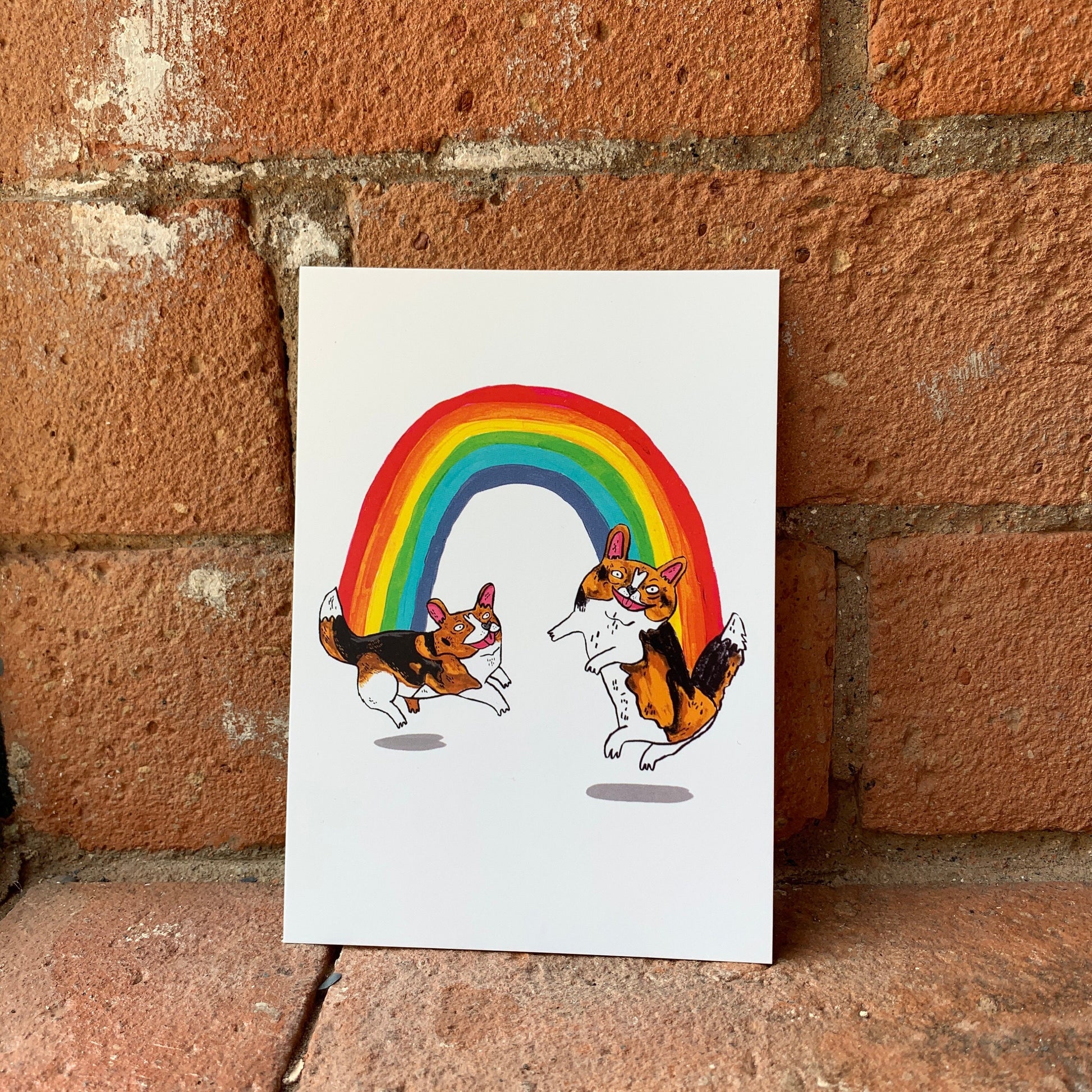 Dancing Corgi dogs under a Rainbow postcard A6 / mini print - Fernandes Makes